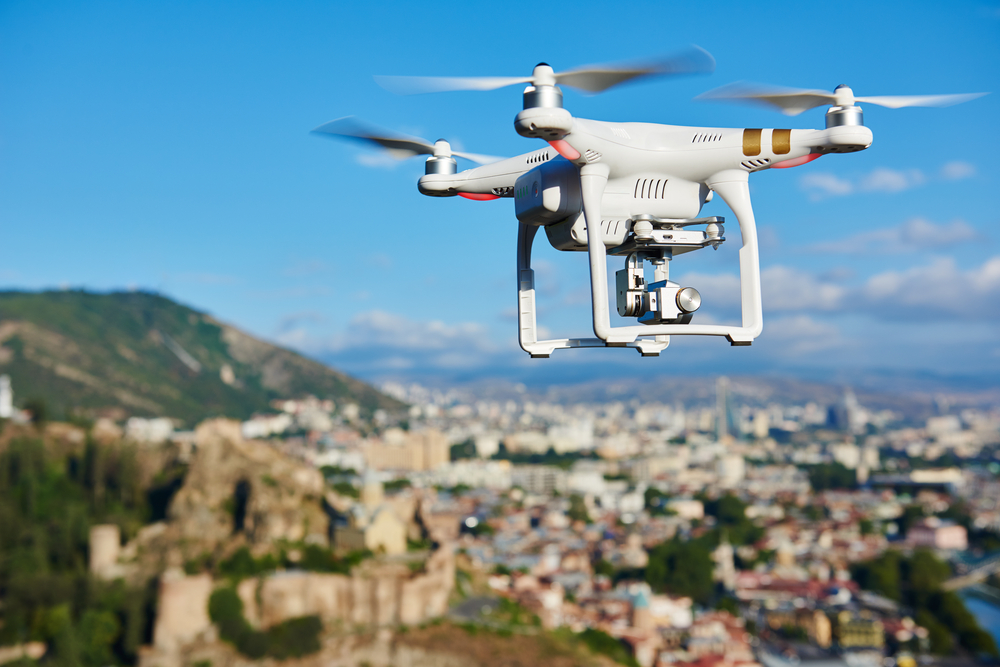 drone flying near city