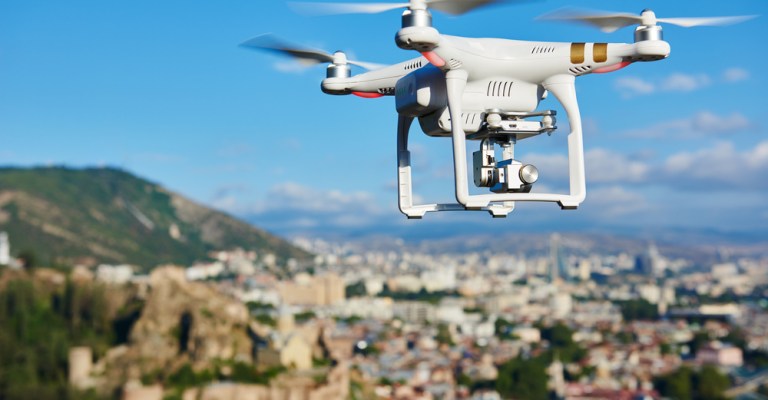 drone flying near city