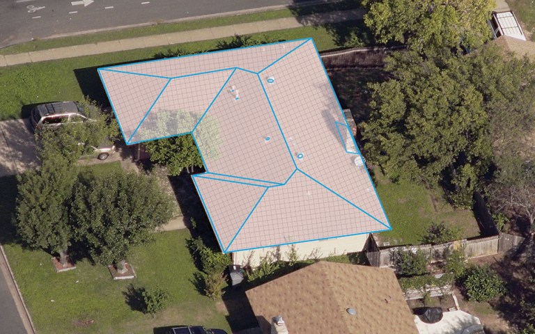 An example of roof length measurements and annotations of penetrations on a residential roof.