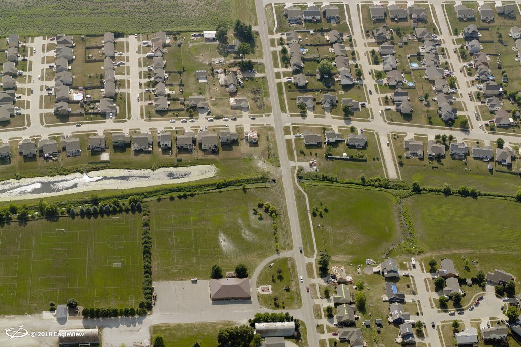Homes with tornado damage in Polk County, Iowa.