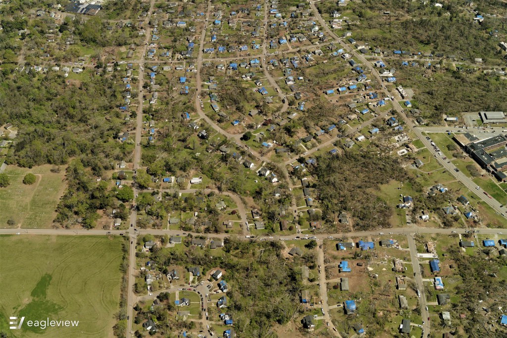 Blue tarps indicate damaged roofs in Coweta County, Georgia.