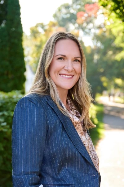 Marcy Comer - General Counsel
