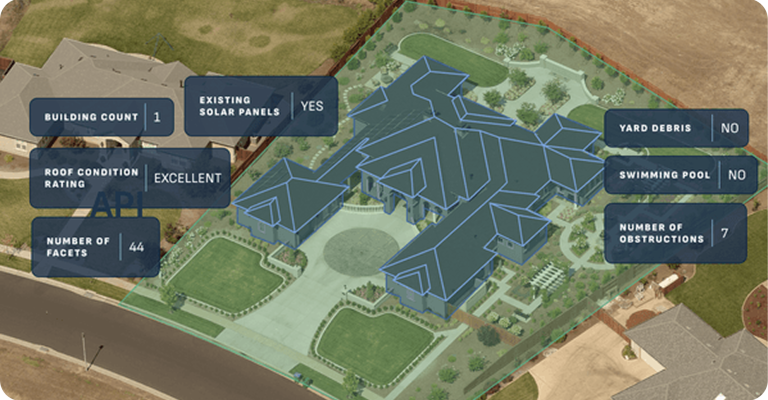Aerial view of a large residential property with a complex, multi-section roof outlined in blue.